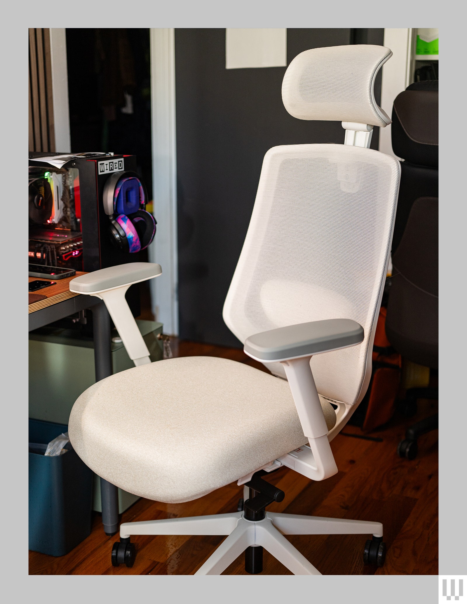 Branch Ergonomic Chair Pro a white office chair on wheels with mesh headrest mesh back rest and padded seat