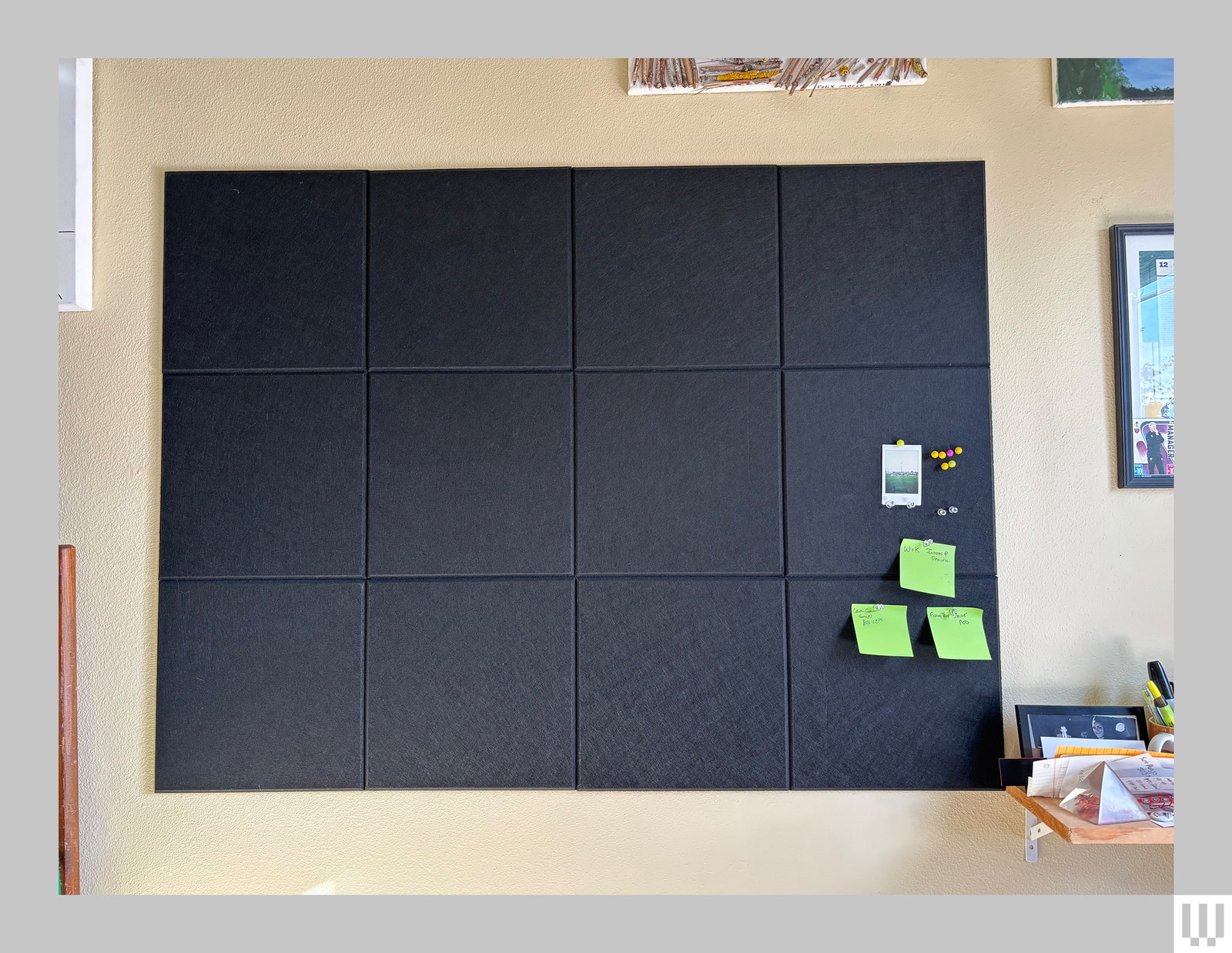 Felt Wall Tiles in black with postit notes pinned to the bottom right