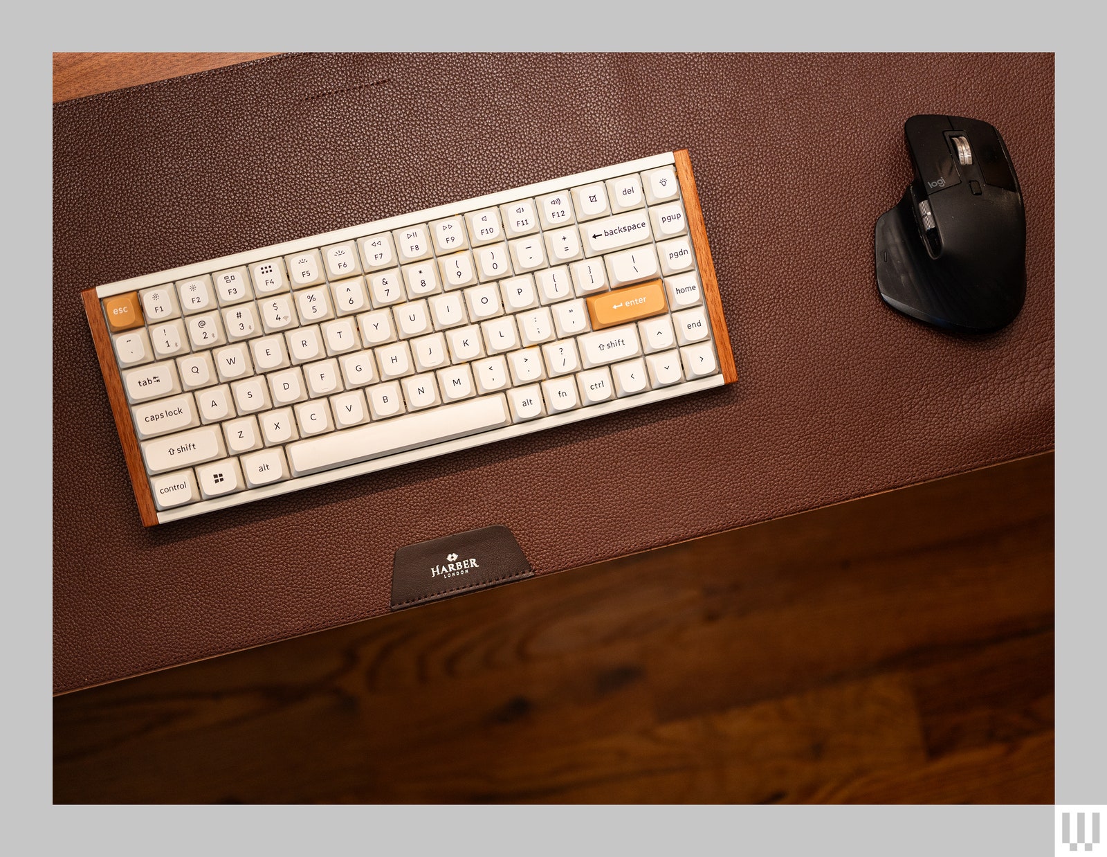 Harber London Professional Leather Desk Mat a brown leathertextured mat with a computer keyboard and black computer...