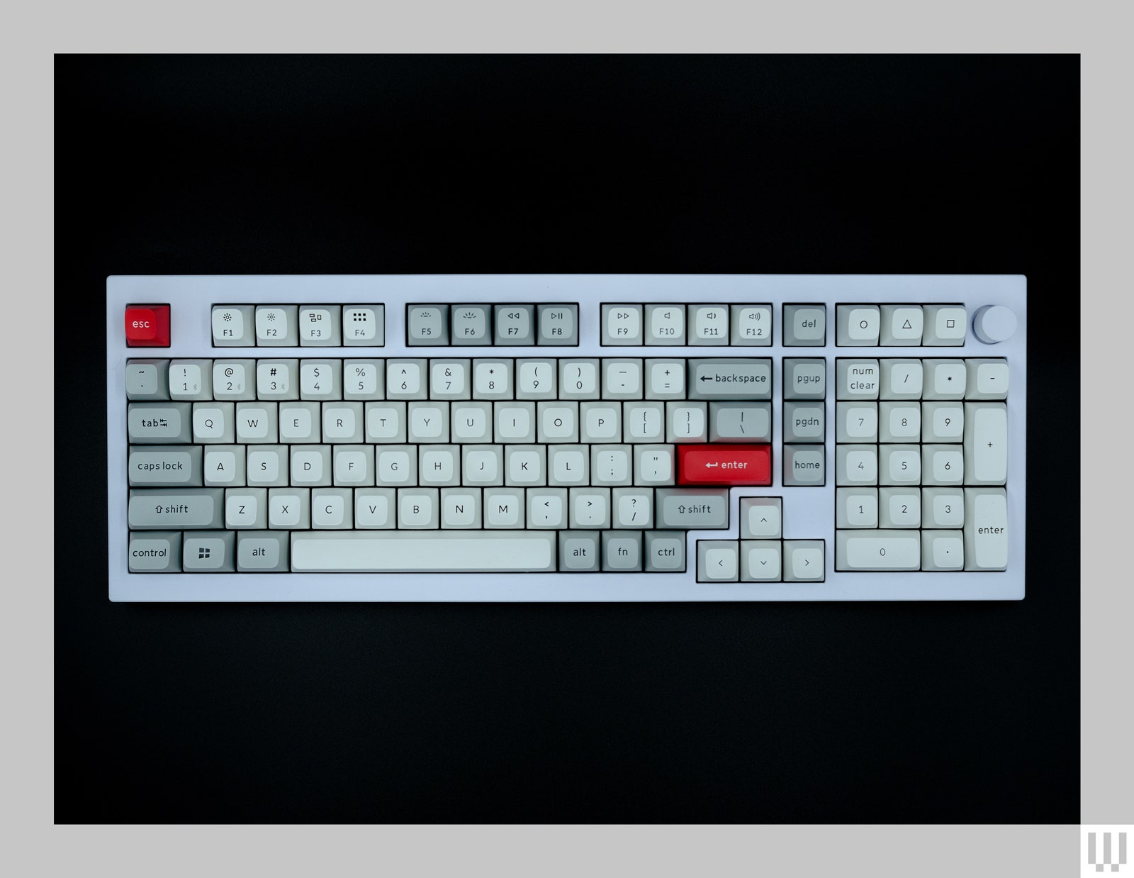 White computer keyboard with white grey and red keys