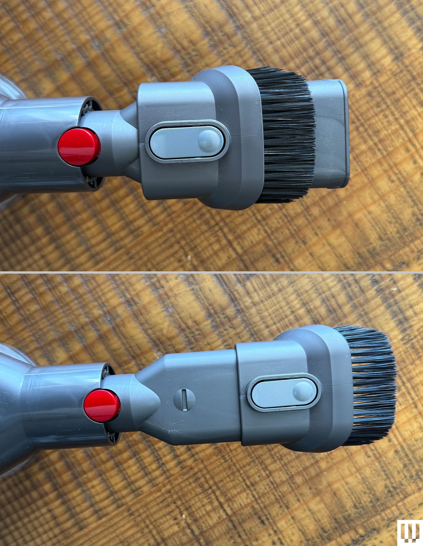 Overhead view of Dyson CarBoat Handheld Vacuum showing extension of the nozzle through the brush.
