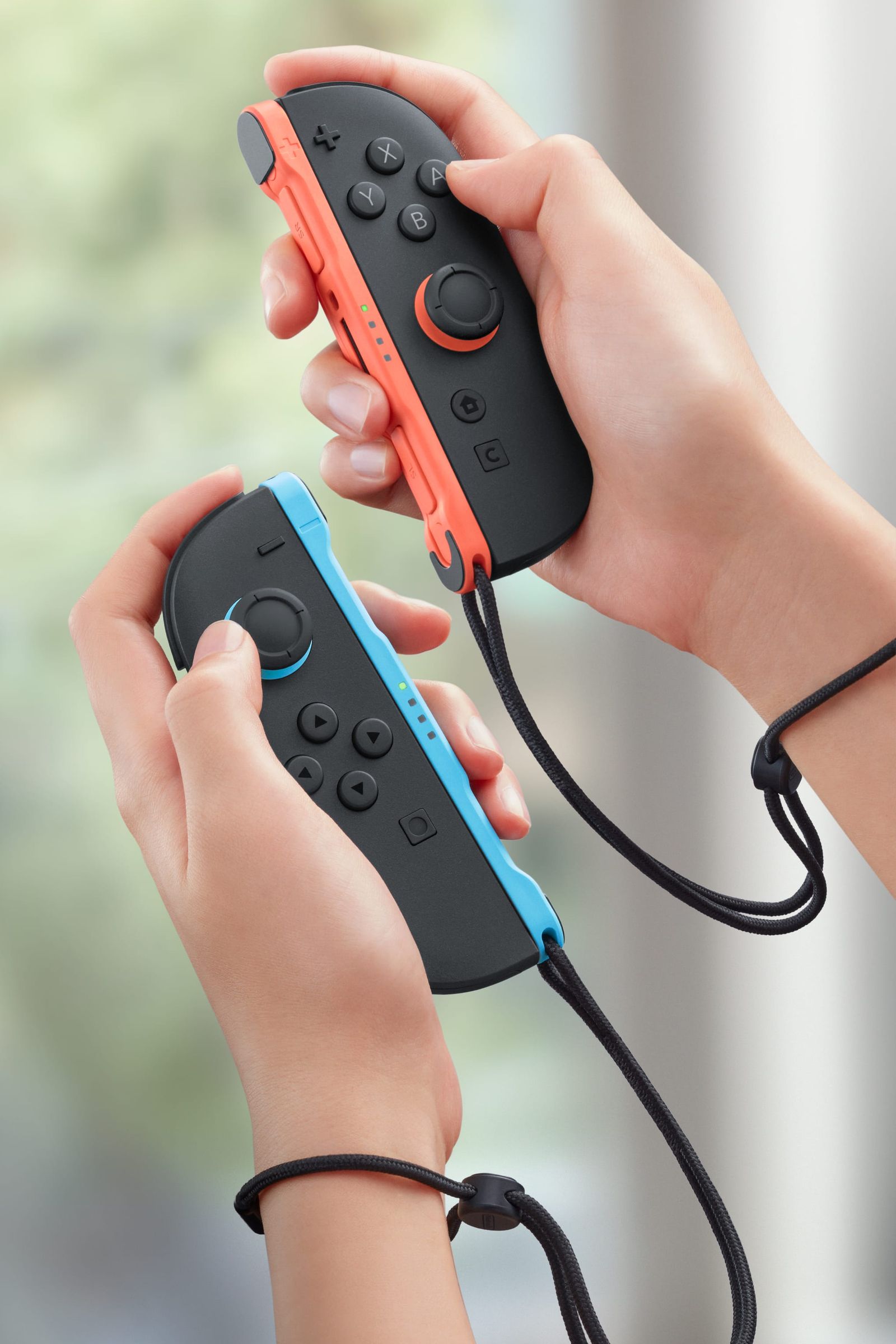 Image may contain Adult Person Electronics and Remote Control