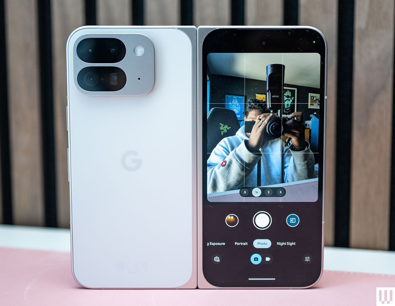 Google Pixel 9 Pro Fold a foldable mobile phone fully open showing the backside cameras and the front side screen.