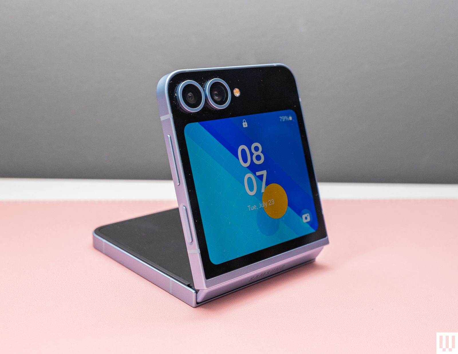 Samsung Galaxy Z Flip6 a foldable phone showing the exterior screen and cameras