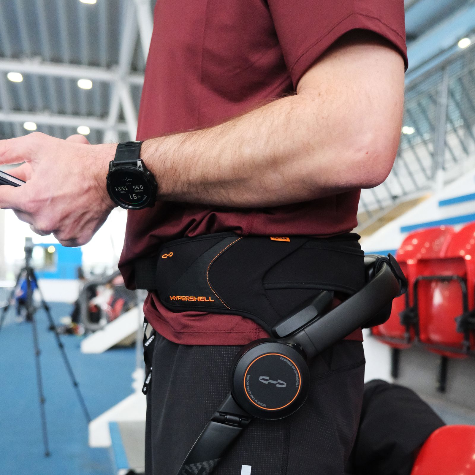 Image may contain Adult Person Racket Sport Tennis Tennis Racket Accessories Bag Handbag Wristwatch and Belt