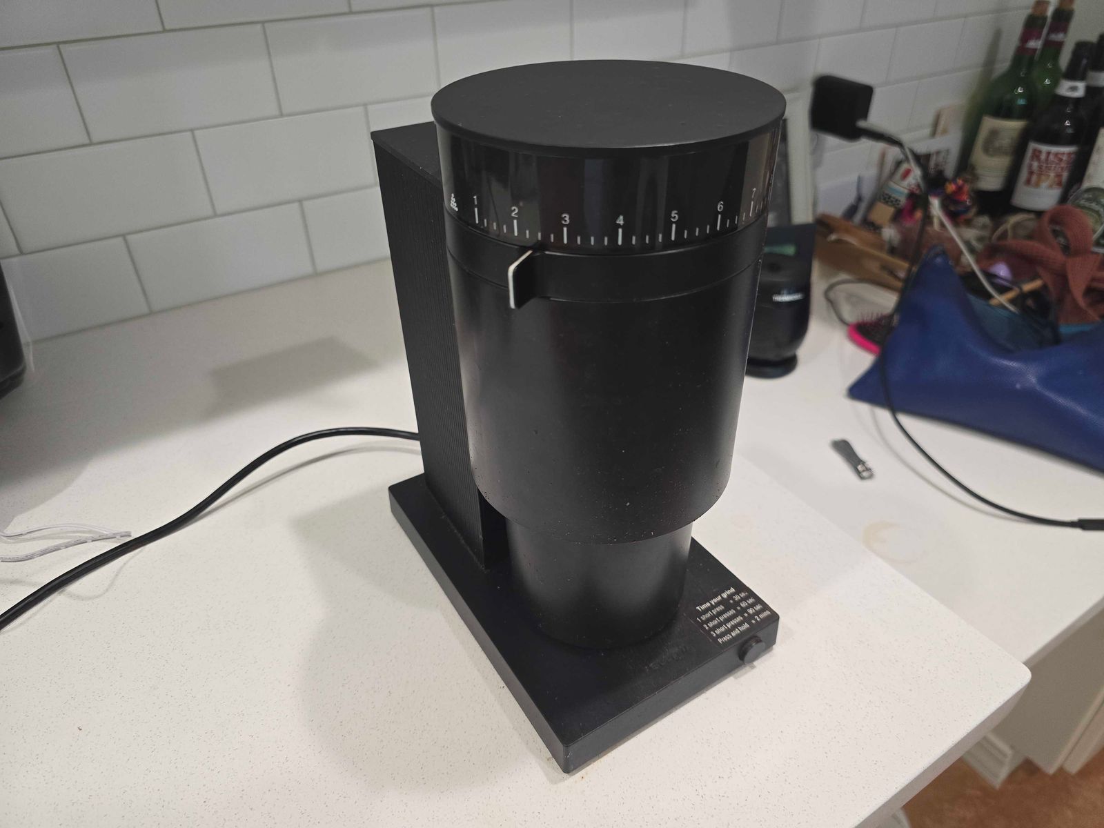 Fellow Opus Conical Burr Grinder on home kitchen countertop
