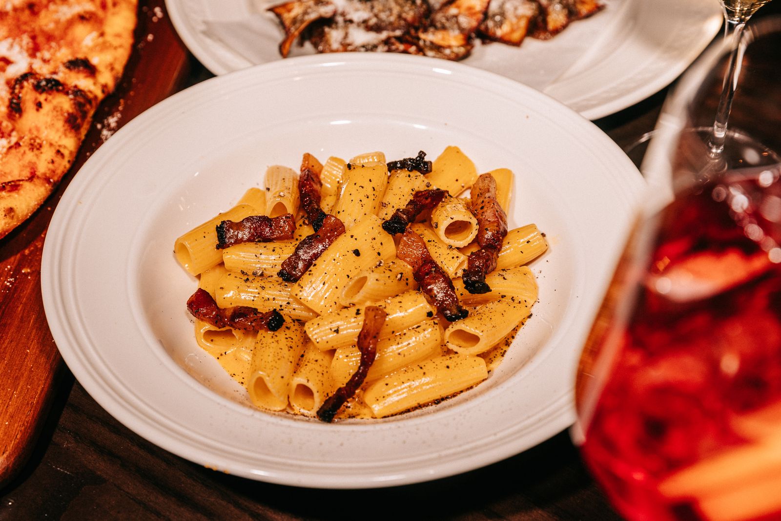 Image may contain Food Food Presentation Pasta Plate Meat and Pork