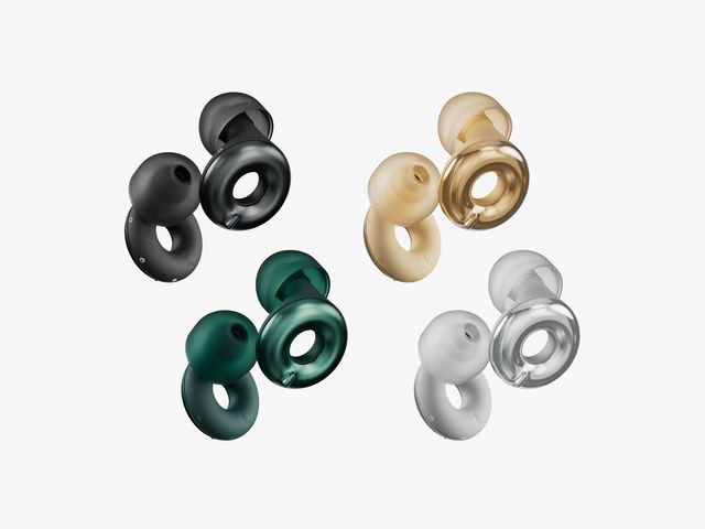 4 pairs of the Loop Switch 2 earplugs in black, gold, green and silver (small earbuds with cushions on one end and a circular ring on the other)