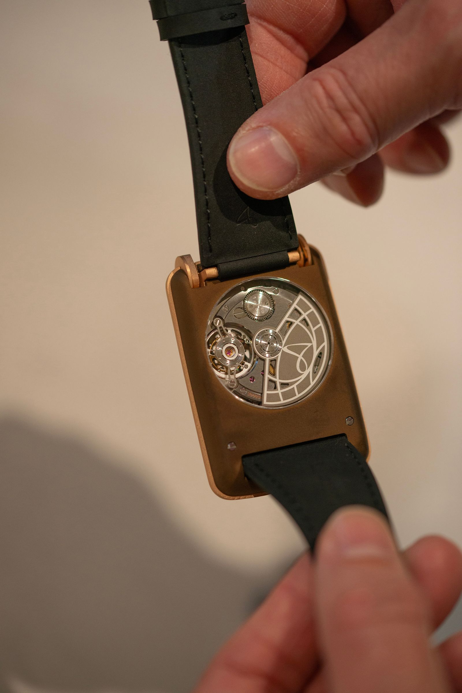 The backside of Hautlence's new watch with a clear window to view internal watch hardware