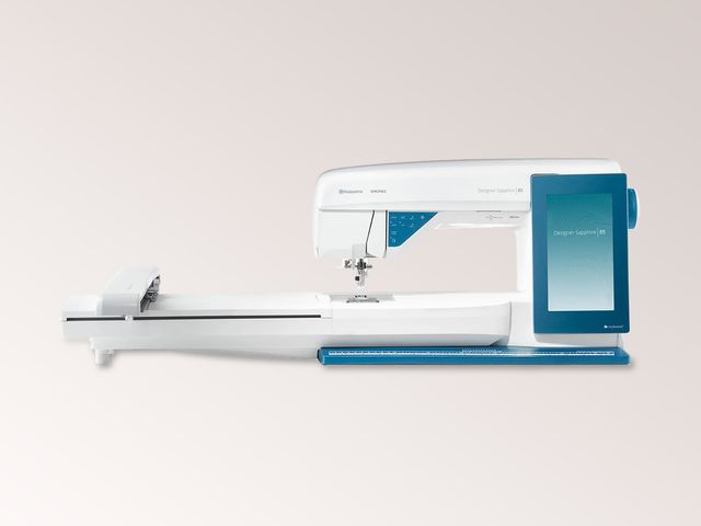 Image may contain: Machine, Appliance, Device, Electrical Device, Sewing, and Sewing Machine