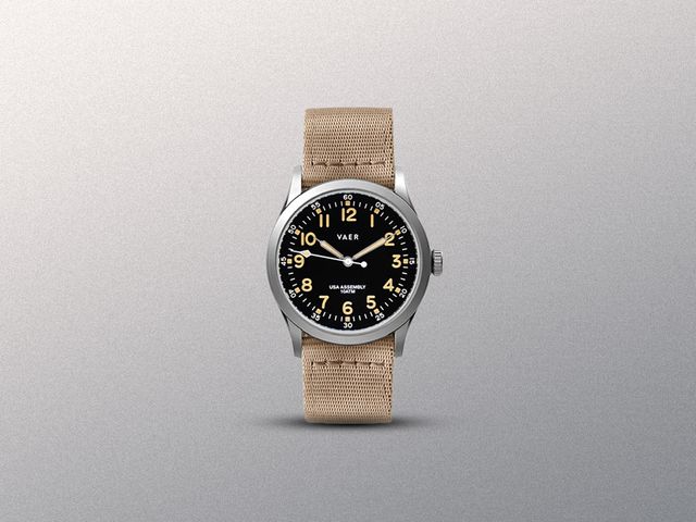 Image may contain: Wristwatch, Arm, Body Part, and Person