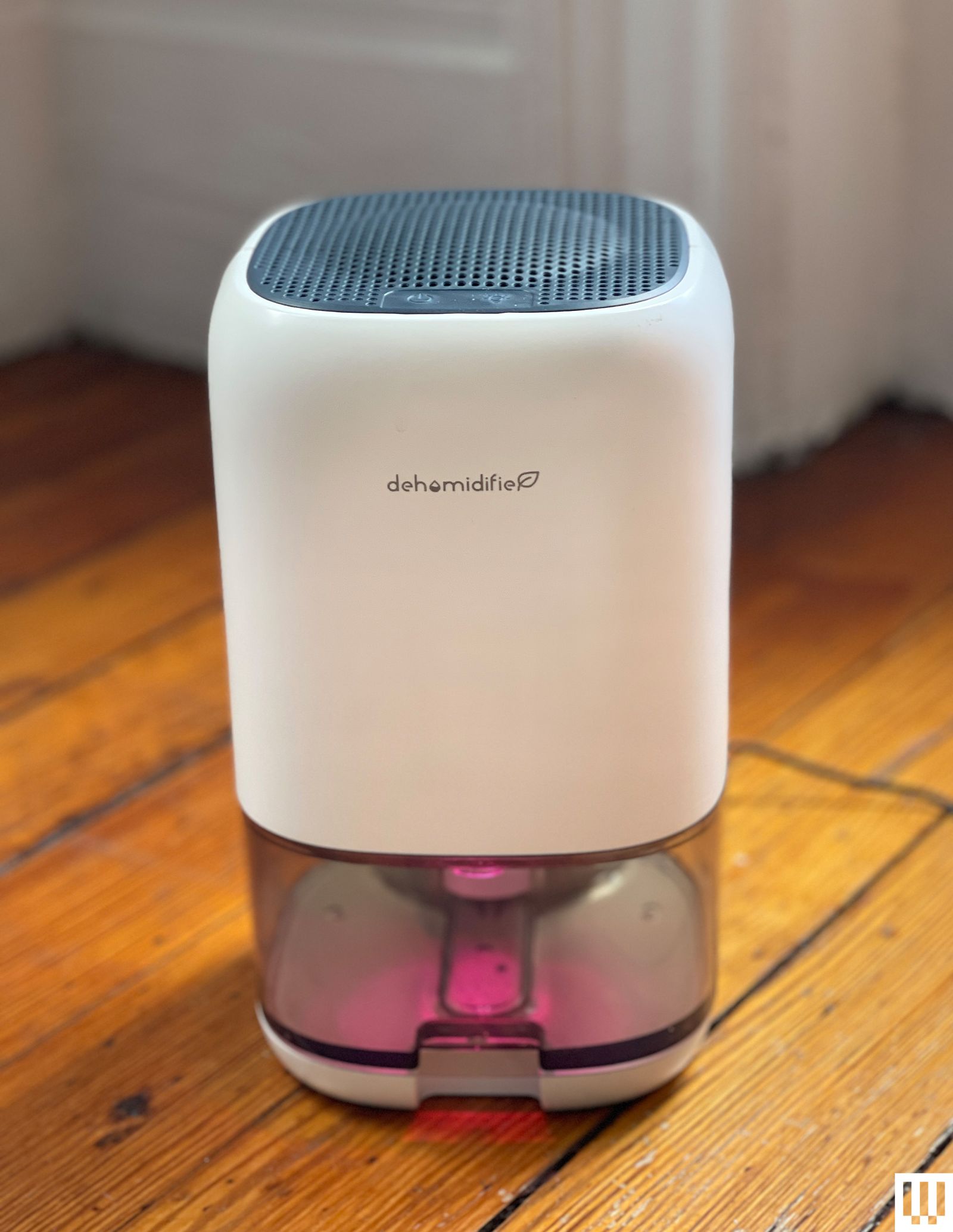 Image may contain Electronics Speaker Jar Indoors and Interior Design