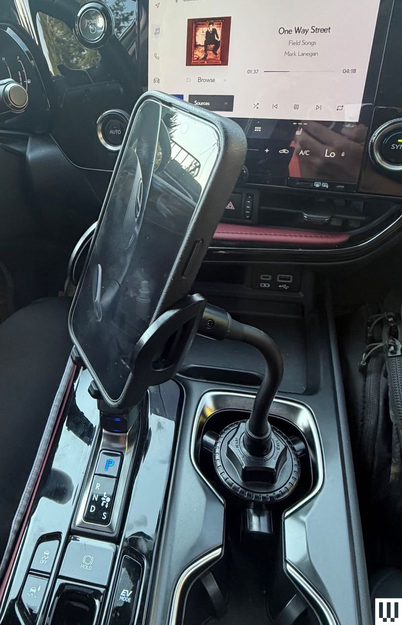 Image may contain Car Transportation Vehicle and Person