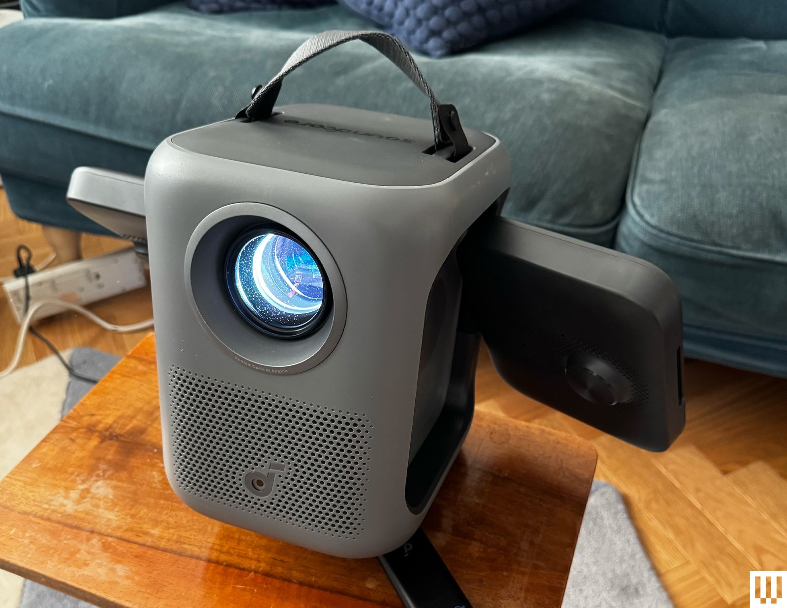 Image may contain Electronics Speaker and Lamp
