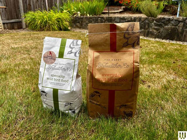 Image may contain: Grass, Plant, Bag, Box, Animal, Bird, Powder, Backyard, Nature, Outdoors, and Yard