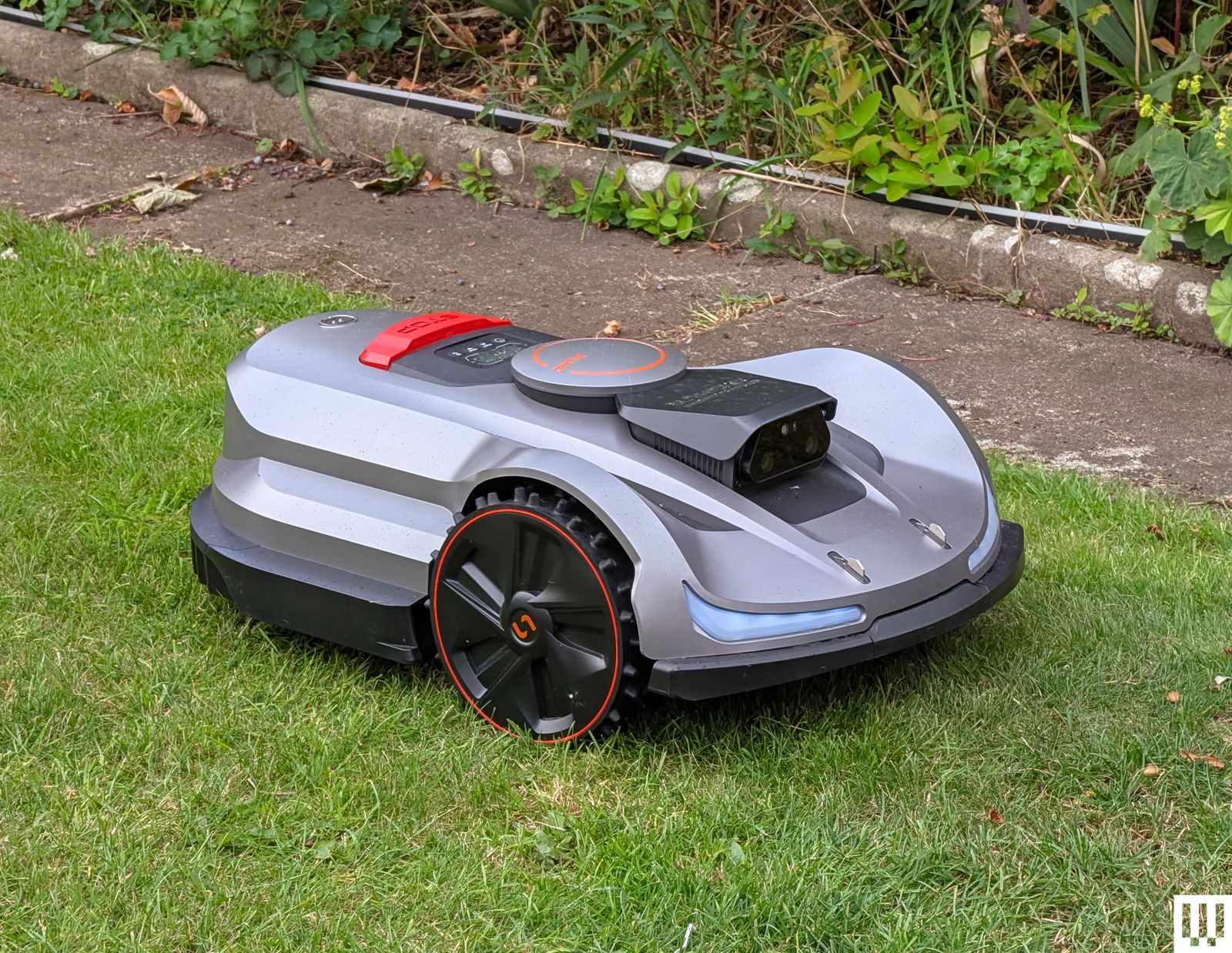 Image may contain Grass Lawn Plant Machine Wheel Device Lawn Mower and Tool